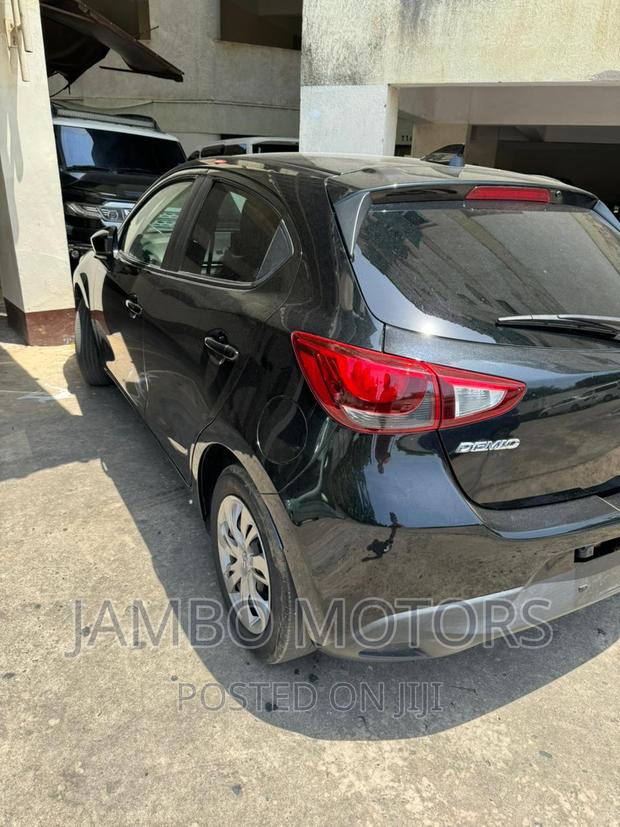 Gray Mazda Demio 2017 - Compact Car with High-Tech Features and Low Emissions