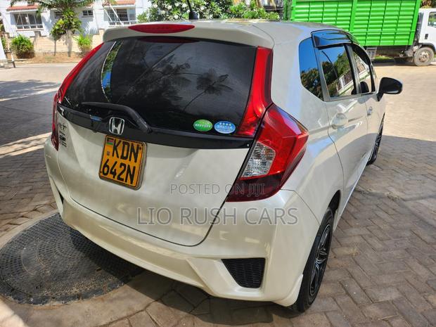 2016 Honda Fit - White, Pre-owned Sedan
