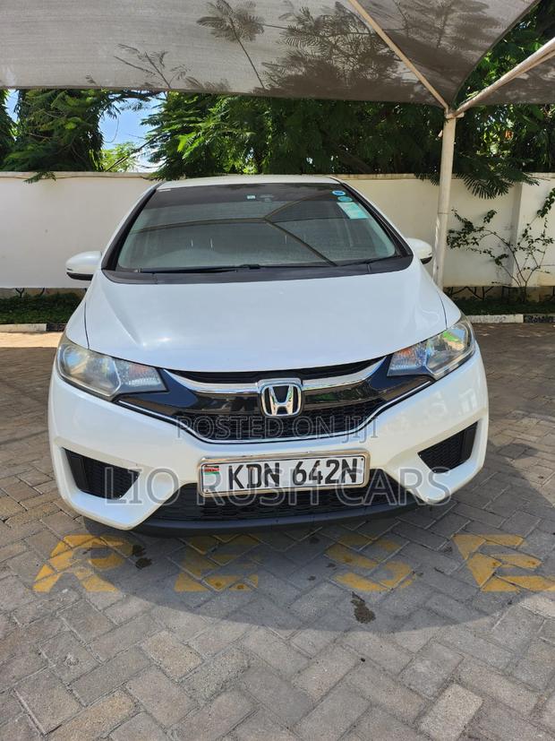 2016 Honda Fit - White, Pre-owned Sedan