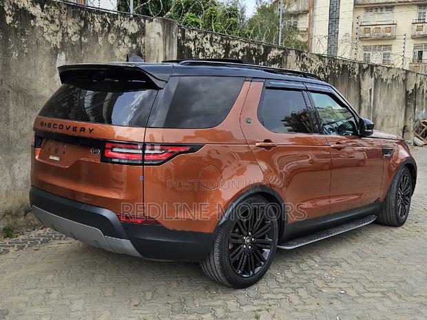 2017 Land Rover Discovery Sport SE in Vibrant Orange - Pre-Owned Luxury