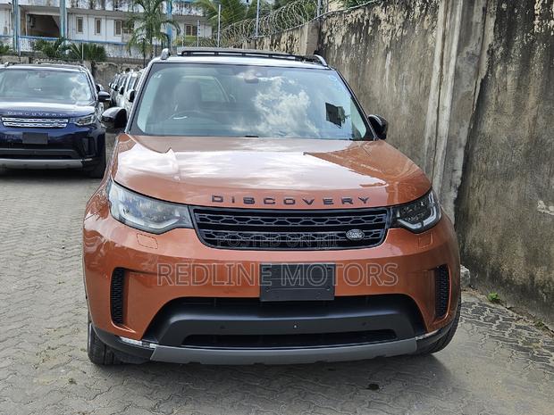 2017 Land Rover Discovery Sport SE in Vibrant Orange - Pre-Owned Luxury