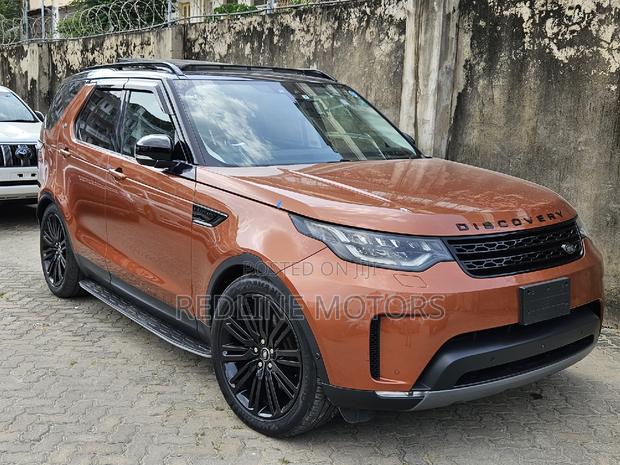 2017 Land Rover Discovery Sport SE in Vibrant Orange - Pre-Owned Luxury