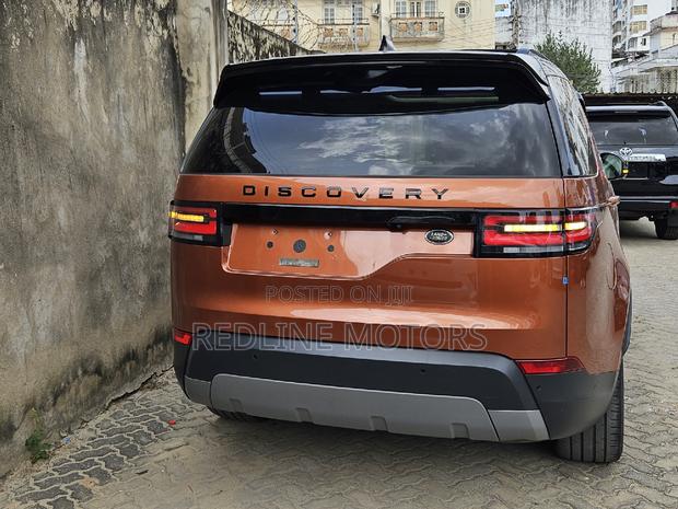 2017 Land Rover Discovery Sport SE in Vibrant Orange - Pre-Owned Luxury