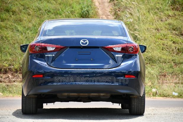 Blue Mazda Axela 2017: Modern Compact Sedan with Style