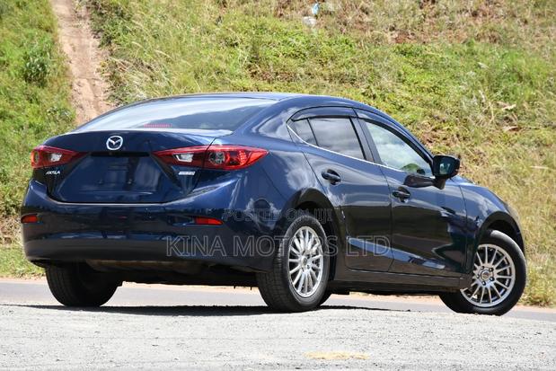 Blue Mazda Axela 2017: Modern Compact Sedan with Style