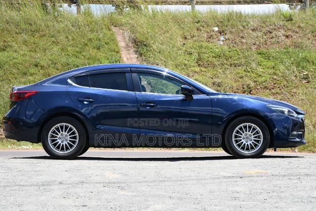 Blue Mazda Axela 2017: Modern Compact Sedan with Style