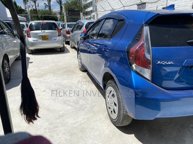 2016 Toyota Aqua Blue: Eco-Friendly Compact Sedan