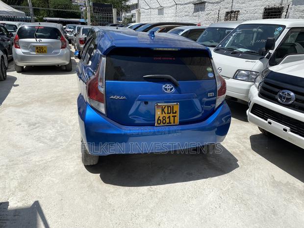 2016 Toyota Aqua Blue: Eco-Friendly Compact Sedan