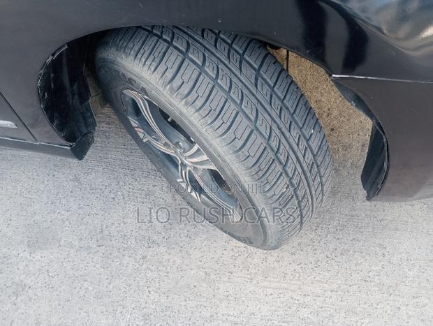 Black 2009 Nissan Bluebird: Ideal for Daily Commute and Family Outings