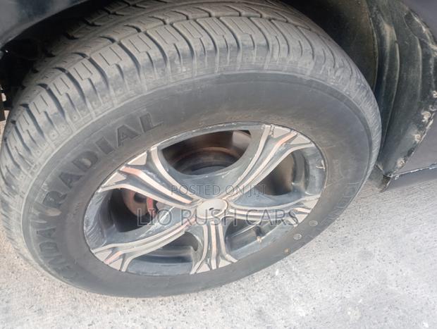 Black 2009 Nissan Bluebird: Ideal for Daily Commute and Family Outings