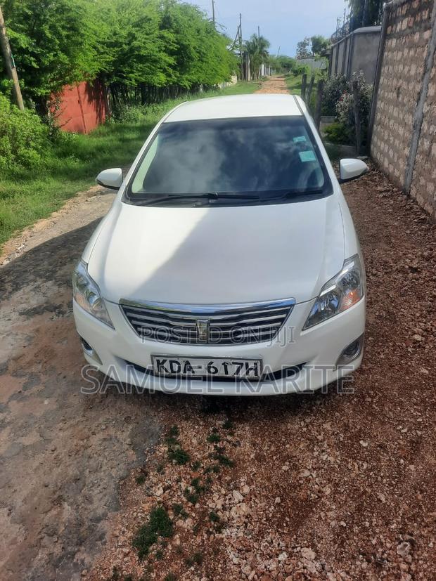 2014 Toyota Premio White Hybrid Wagon