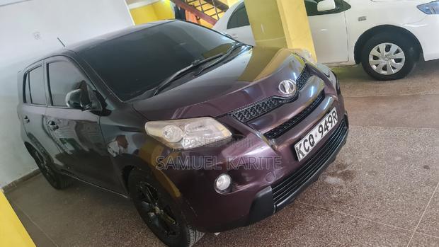 Purple Toyota IST 2011 - Stylish and Affordable Compact Sedan for Everyday Use