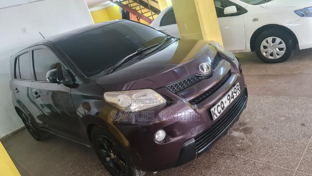 Purple Toyota IST 2011 - Stylish and Affordable Compact Sedan for Everyday Use