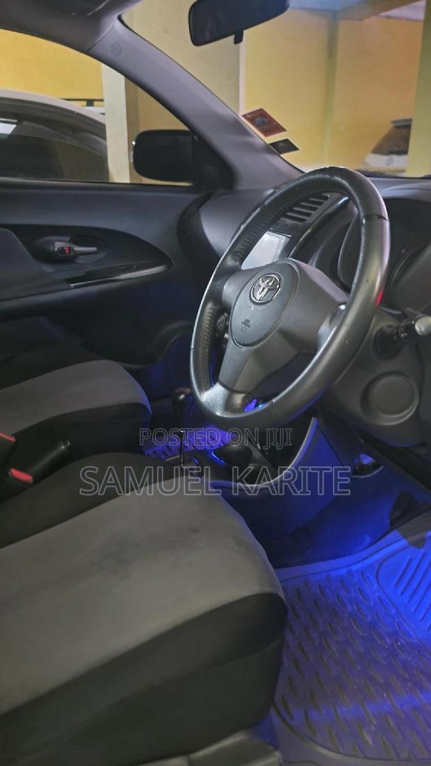Purple Toyota IST 2011 - Stylish and Affordable Compact Sedan for Everyday Use