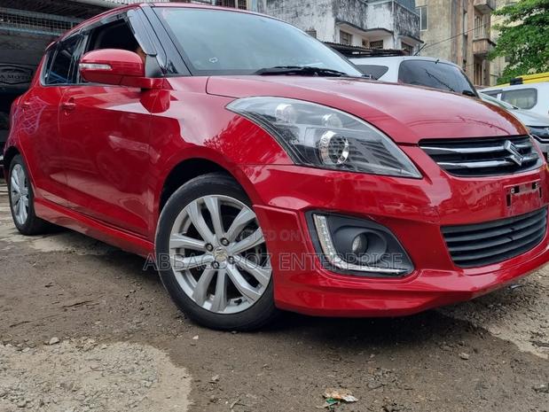 2016 Burgundy Suzuki Swift - Compact Car for Your Driving Pleasure