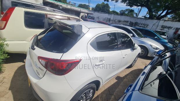 White Mazda Demio 2015 - Perfect for City Driving