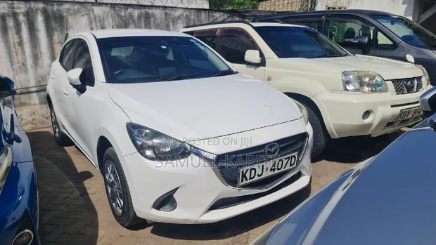 White Mazda Demio 2015 - Perfect for City Driving