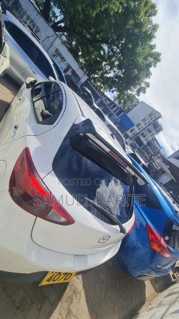 White Mazda Demio 2015 - Perfect for City Driving