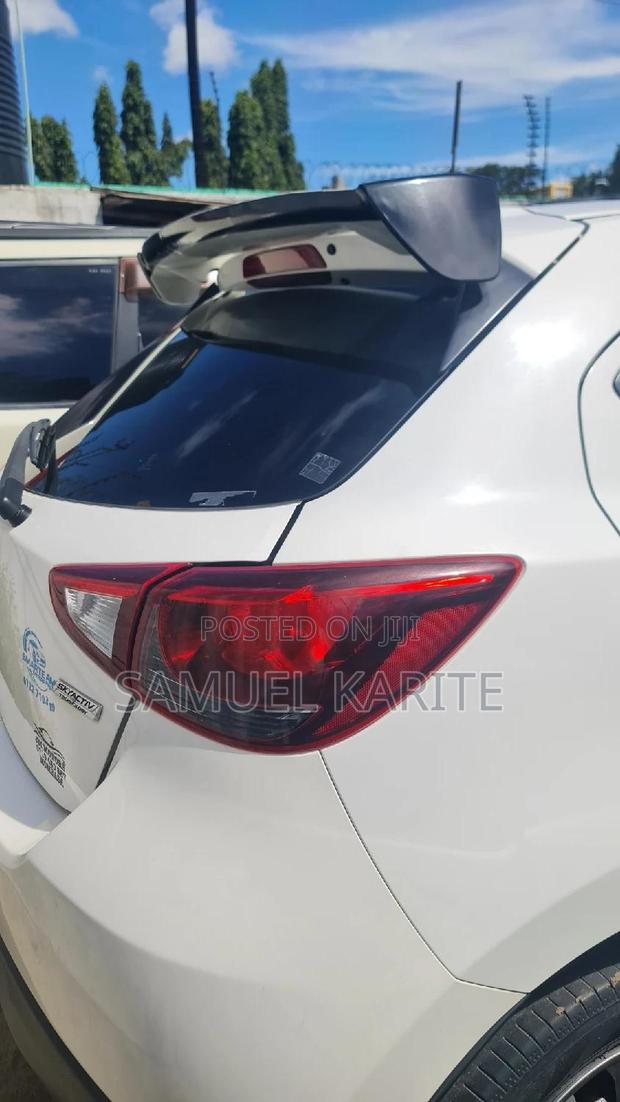 White Mazda Demio 2015 - Perfect for City Driving