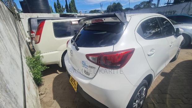 White Mazda Demio 2015 - Perfect for City Driving