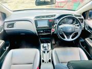 Honda Grace 2017 - Sleek Gray Sedan with Modern Amenities for sale