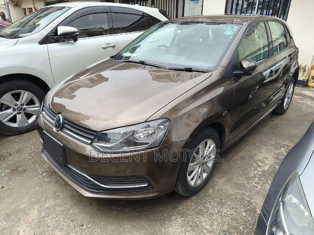 2017 Gold Volkswagen Polo - Premium Compact Car