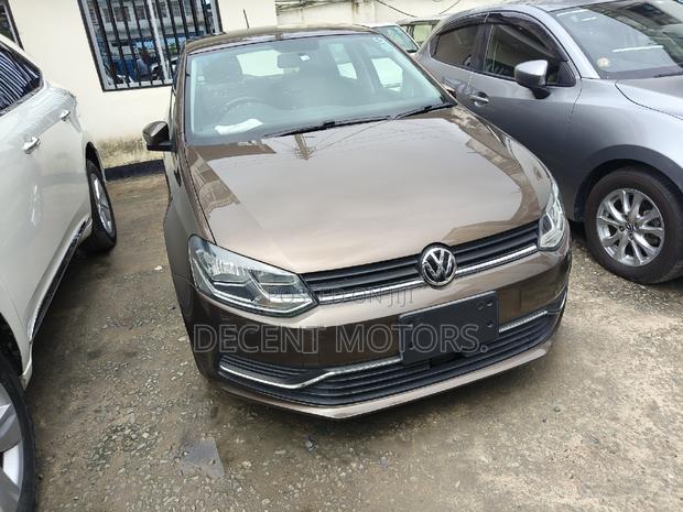 2017 Gold Volkswagen Polo - Premium Compact Car