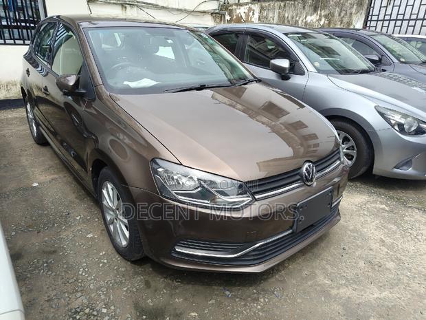 2017 Gold Volkswagen Polo - Premium Compact Car