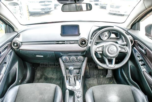 Red 2017 Mazda Demio: Compact Car with Vibrant Appeal