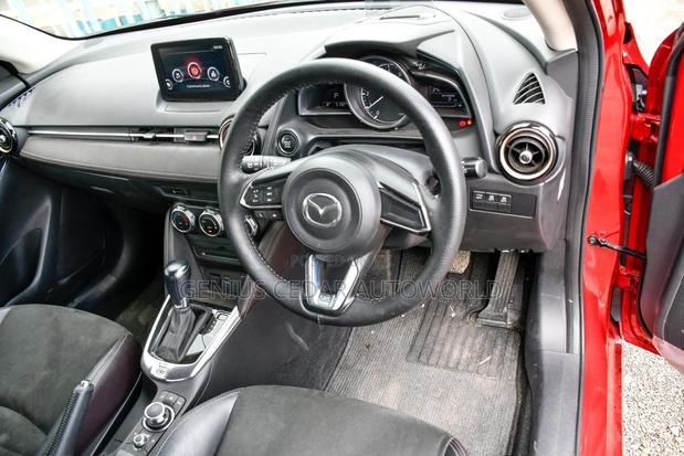 Red 2017 Mazda Demio: Compact Car with Vibrant Appeal