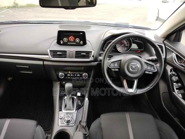 Blue 2018 Mazda Axela: Compact Sedan with Premium Features