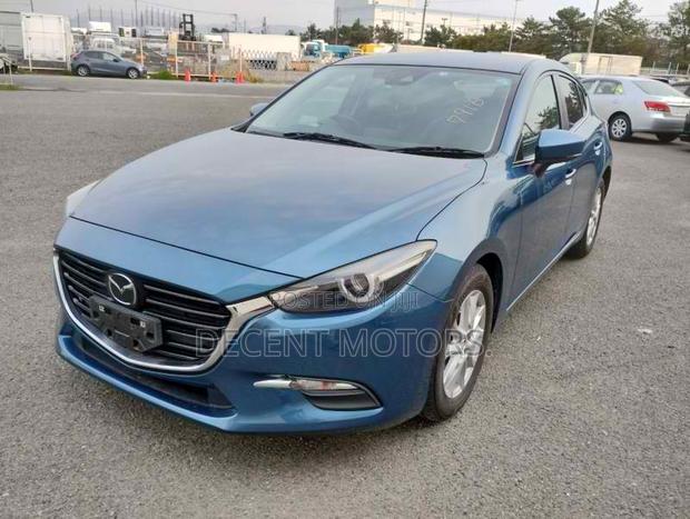 Blue 2018 Mazda Axela: Compact Sedan with Premium Features