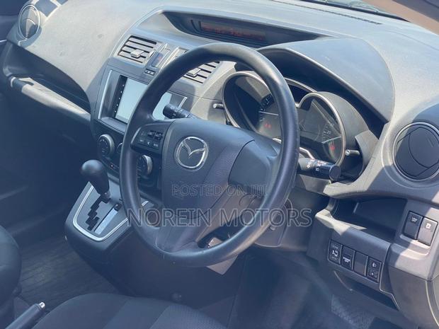 White 2014 Mazda Premacy: Modern Minivan Experience