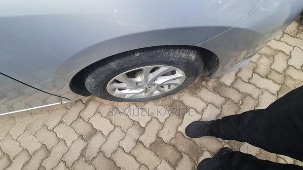 Affordable 2015 Toyota Auris Silver: Compact Sedan with Class