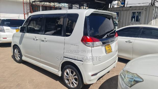 Pre-owned 2015 Suzuki Solio White - Great Deal on a Stylish Car
