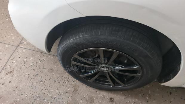 White 2016 Nissan March Hatchback - Affordable Used Car