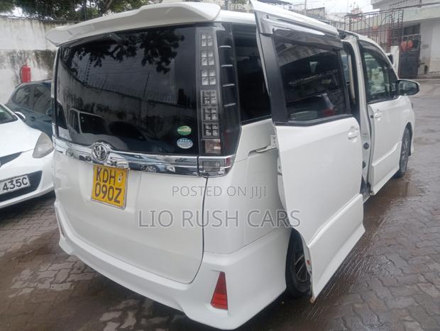 Premium 2014 Toyota Voxy SV in White - High-End MPV Offer