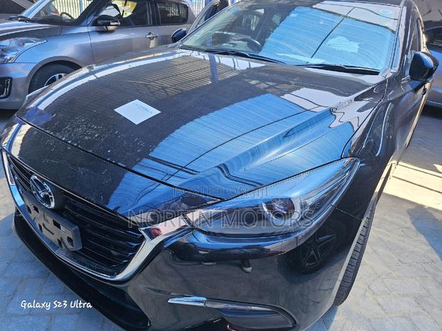 Black Mazda Axela 2017: Pre-owned Sedan with Style