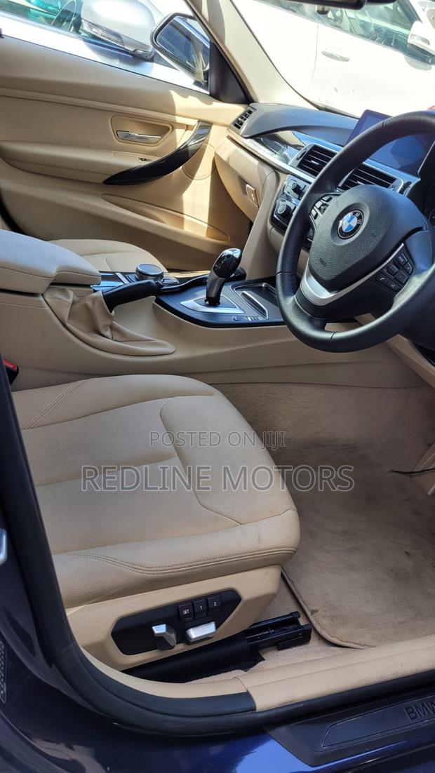 Pre-owned 2017 BMW 318i Sports Wagon in Blue