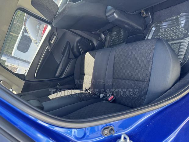 Pre-owned Blue 2014 Honda Fit - Compact & Versatile Sedan