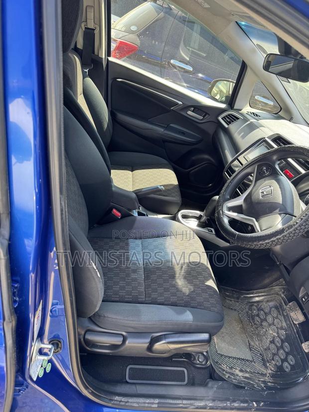 Pre-owned Blue 2014 Honda Fit - Compact & Versatile Sedan