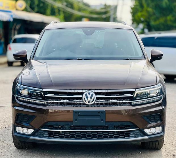 Pre-owned 2018 Volkswagen Tiguan SUV in Brown