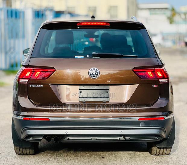 Pre-owned 2018 Volkswagen Tiguan SUV in Brown