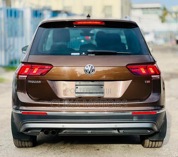 Pre-owned 2018 Volkswagen Tiguan SUV in Brown
