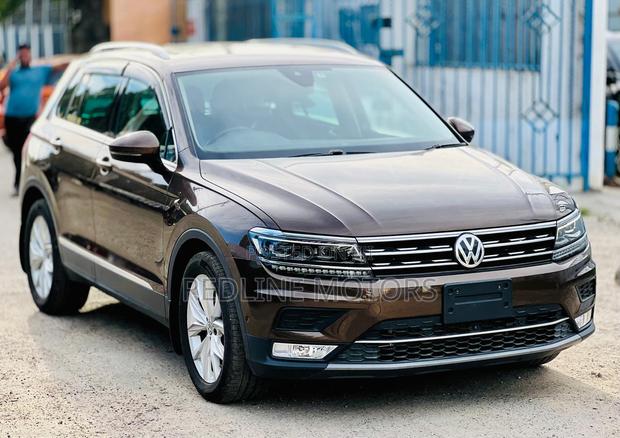 Pre-owned 2018 Volkswagen Tiguan SUV in Brown