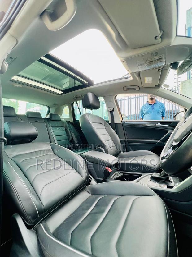 Pre-owned 2018 Volkswagen Tiguan SUV in Brown