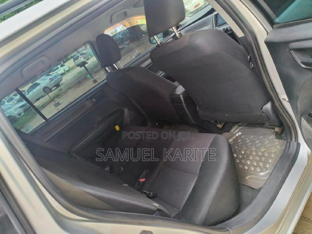 Silver 2015 Toyota Corolla Fielder: A Smart Choice for Your Drive