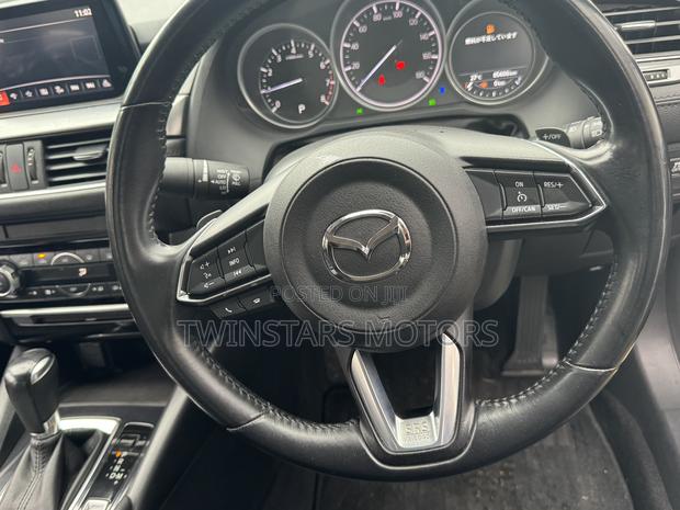 Blue Mazda Atenza 2017 - Affordable Luxury