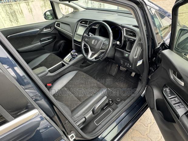 2018 Honda Shuttle Blue 1.5L Hybrid: Spacious and Fuel-Efficient Honda Shuttle