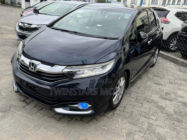 2018 Honda Shuttle Blue 1.5L Hybrid: Spacious and Fuel-Efficient Honda Shuttle